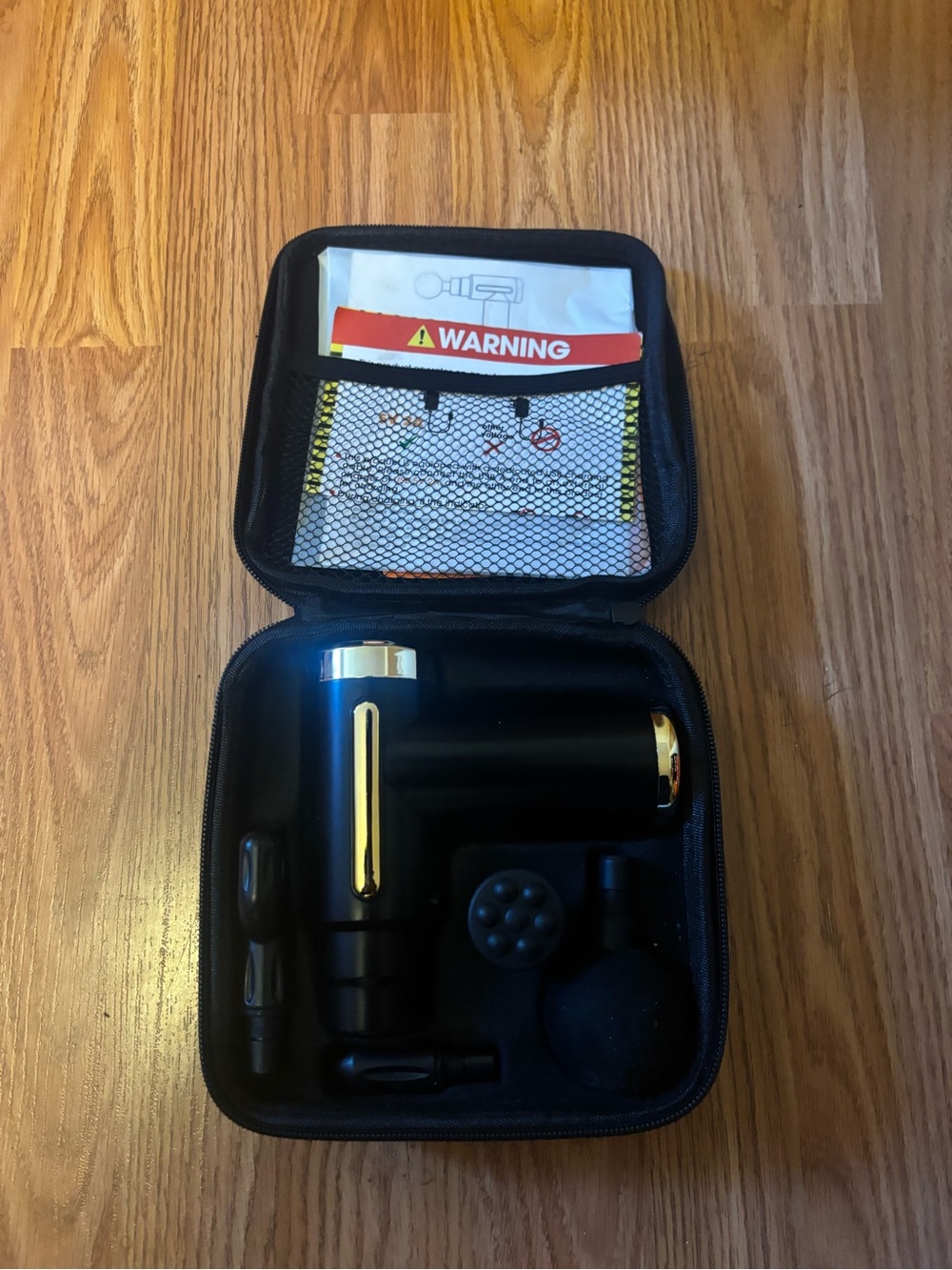 Portable Black & Gold Massage Gun – Compact Percussion Massager